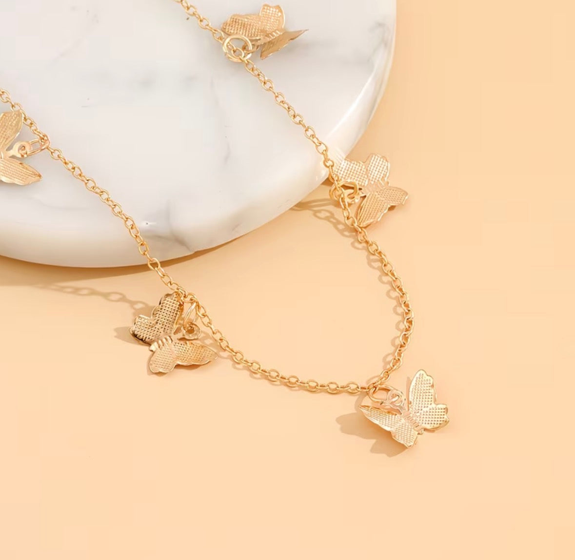 Cadena mariposas doradas